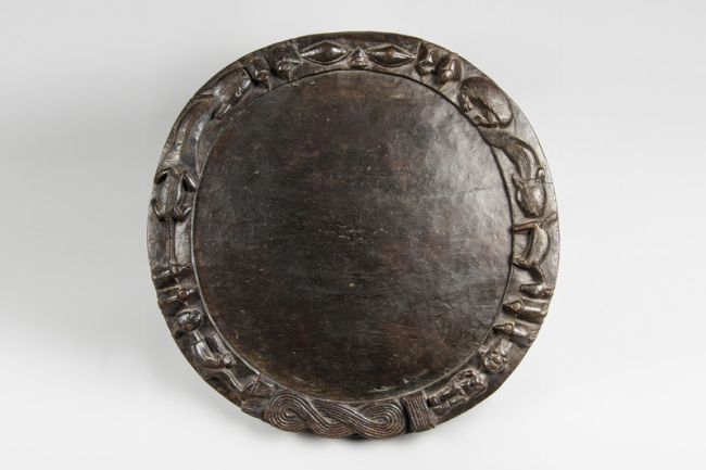 Late 19th century Yoruba people carved wood IFA divination tray. Price realised £475.