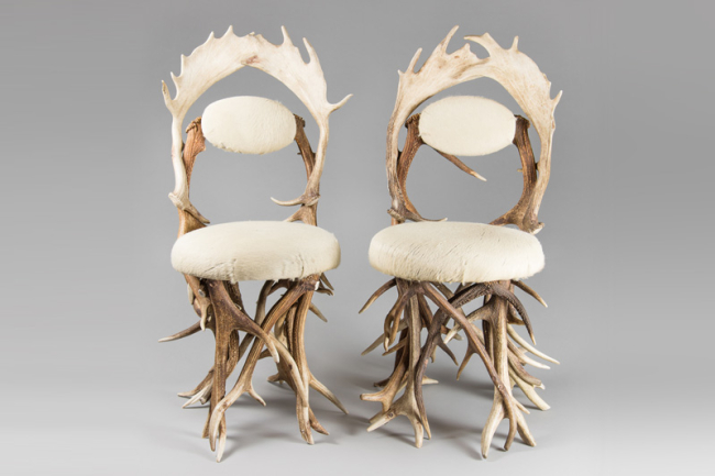 A pair of modern antler hall chairs by Schirato, Italy. Price realised £950.