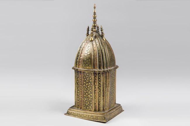 An early 20th century Islamic art enamelled gilt-copper box of architectural form. Price realised £750