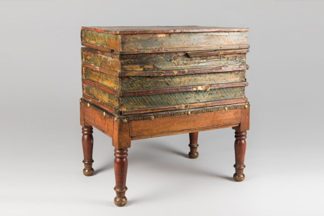 A 19th century English faux book box table. Price realised £850