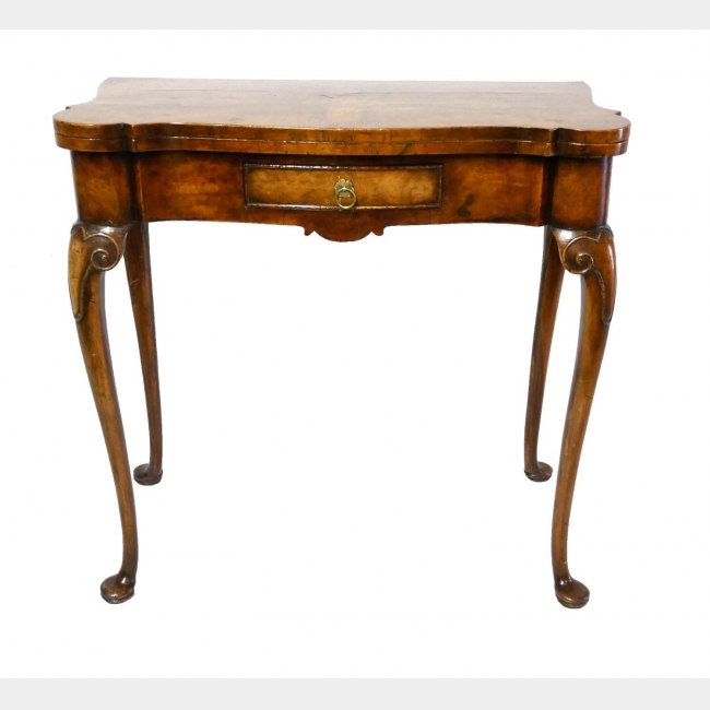A 19TH CENTURY GEORGE II DESIGN FIGURED WALNUT FOLD OVER TEA TABLE