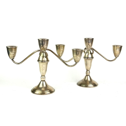 A PAIR OF STERLING SILVER CANDELABRA