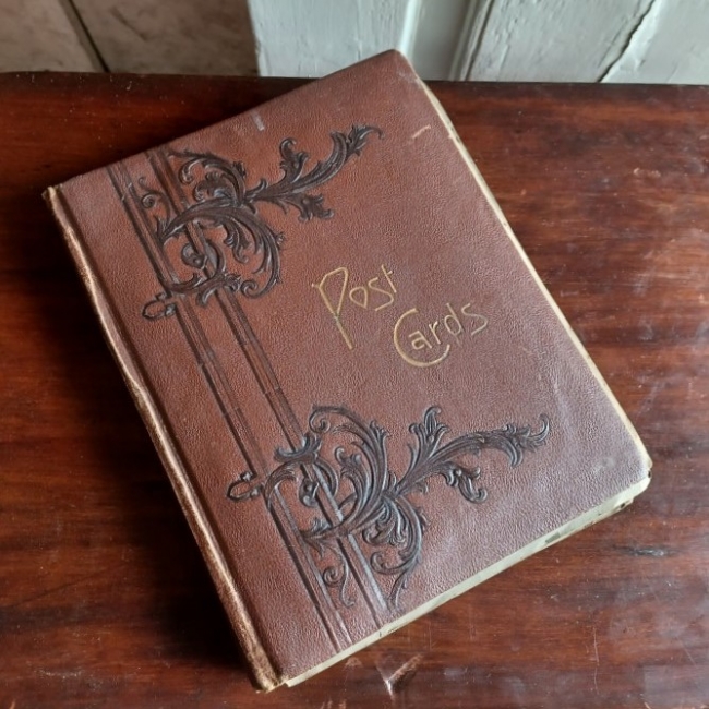 Tooled Leather Postcard Album & Contents