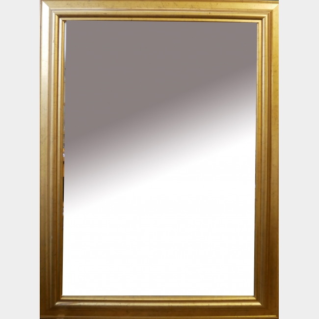 A GILT FRAMED MIRROR