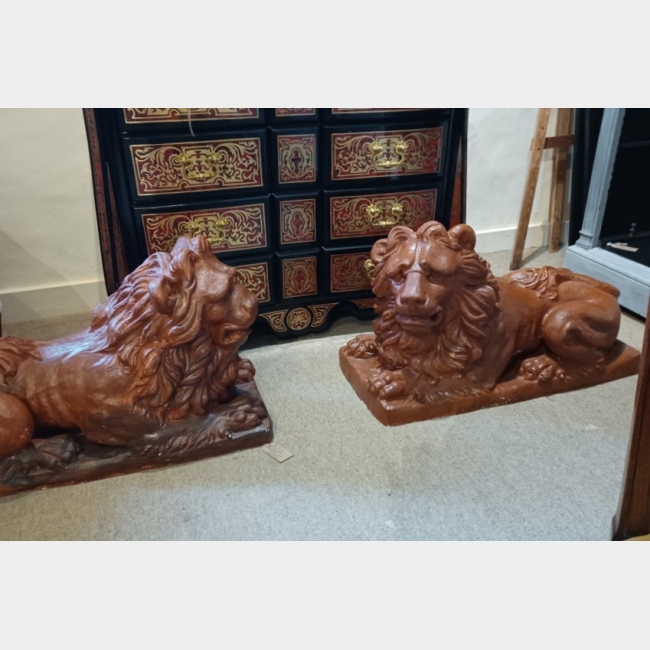 Pair of 20th Century fireside plaster lions