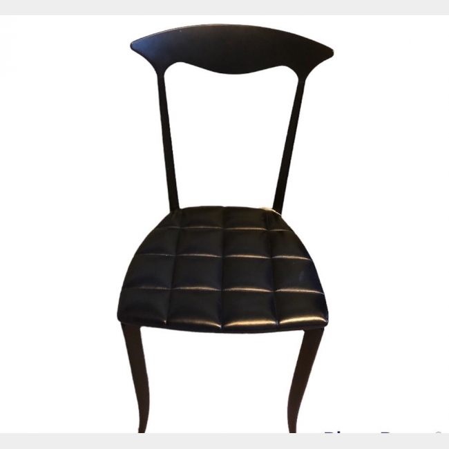 A Designer Alegra Hick Black Metal Chair With Leather Padded Seat