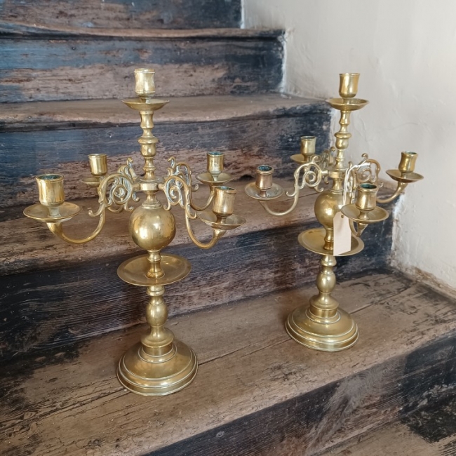 Pair of heavy brass candelabra