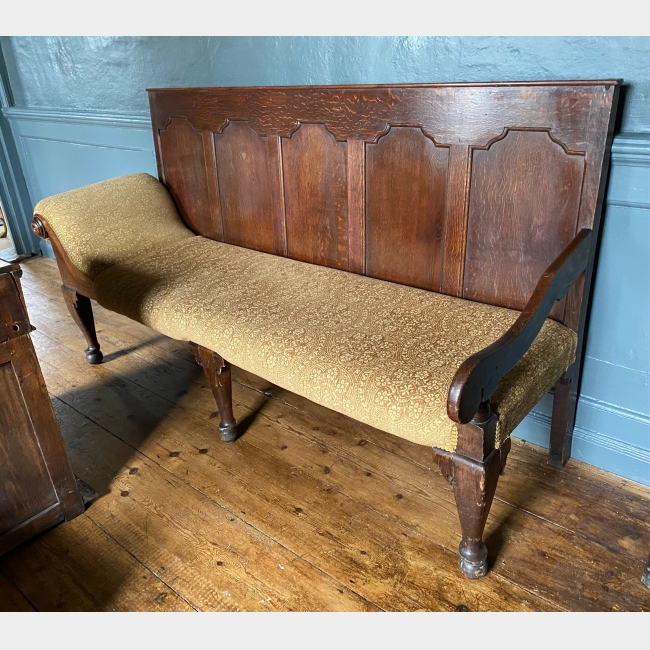 Chaise-ended settle