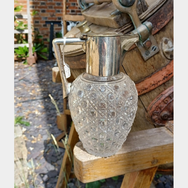 Silver plated cut glass jug