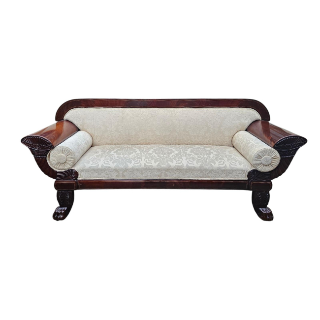 A REGENCY EGYPTIAN REVIVAL MAHOGANY THREE SEAT SETTEE