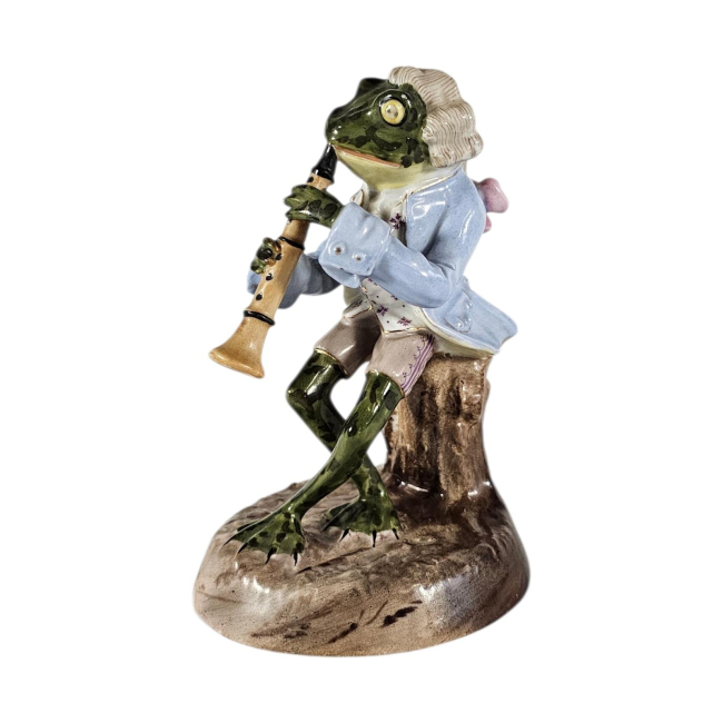 An Early 20th Century Continental Porcelain Frog Musician Figure.