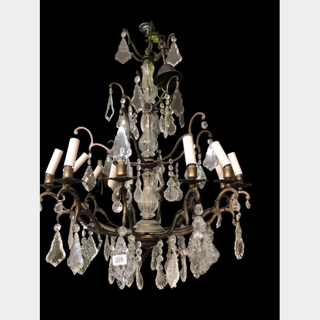 A Large Antique Iron Twelve Branch Chandelier.