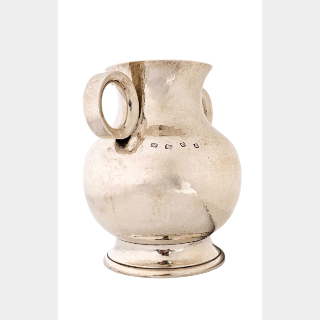 Hicklenton and Philips, an Early 20th Century solid silver vase, hallmarked.